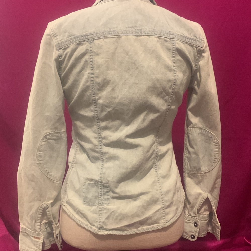 TNA size XS long sleeve jean shirt. Metal Button up. Lightly loved